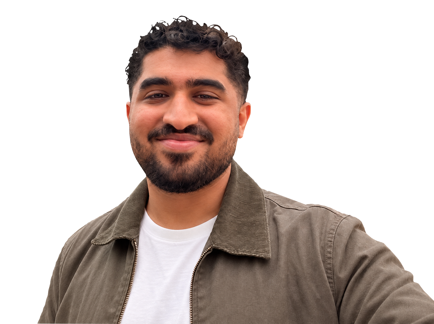 Portrait of Akshay smiling, in an olive jacket over a white T-shirt.